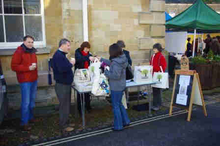 Sustainable Woodstock reusable bags at a local event